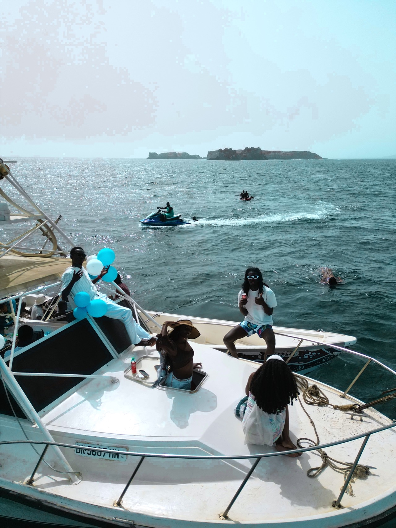 Group celebrating aboard the big boat off Dakar - Boat trip Dakar, Senegal Nautique