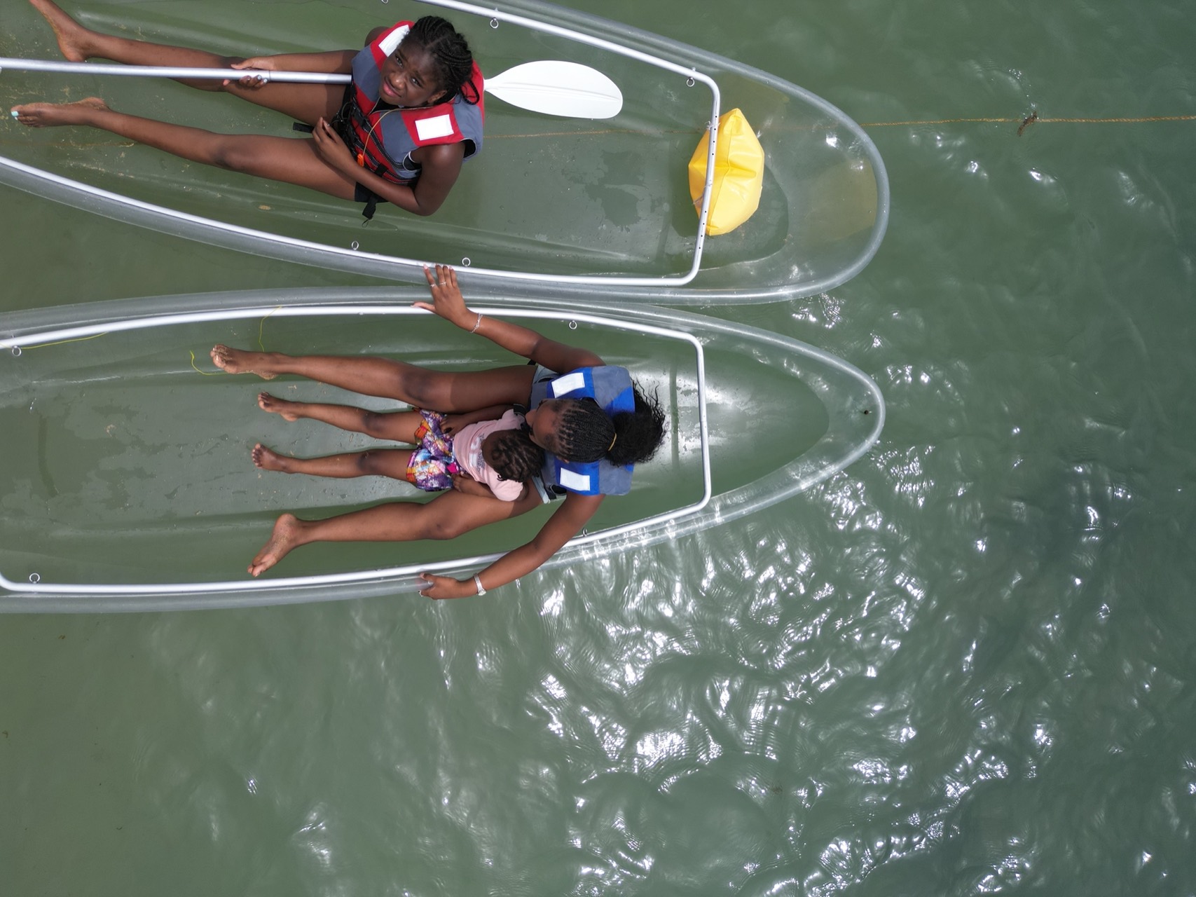 Duo en kayak transparent